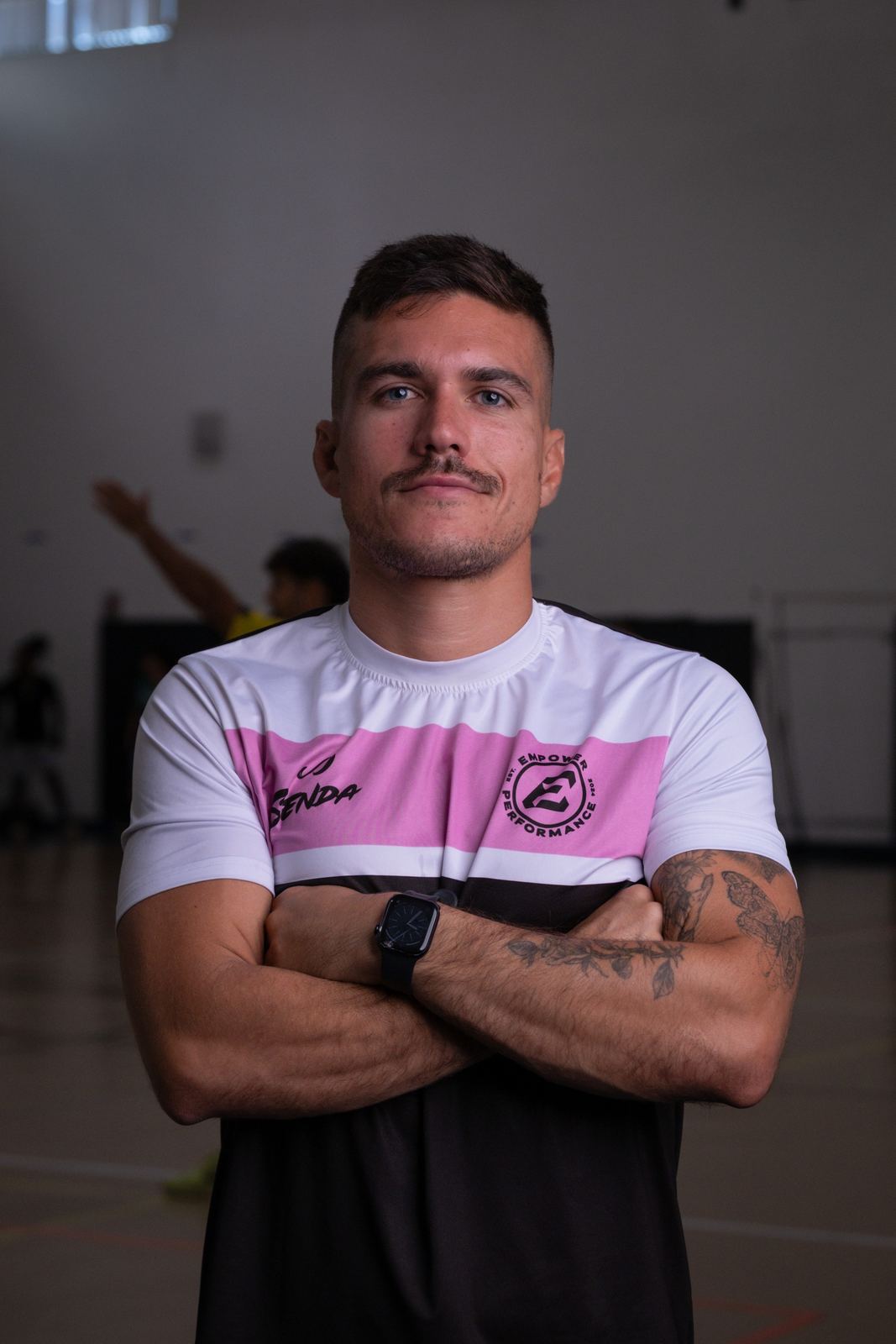 EmPower soccer coach portrait with arms crossed