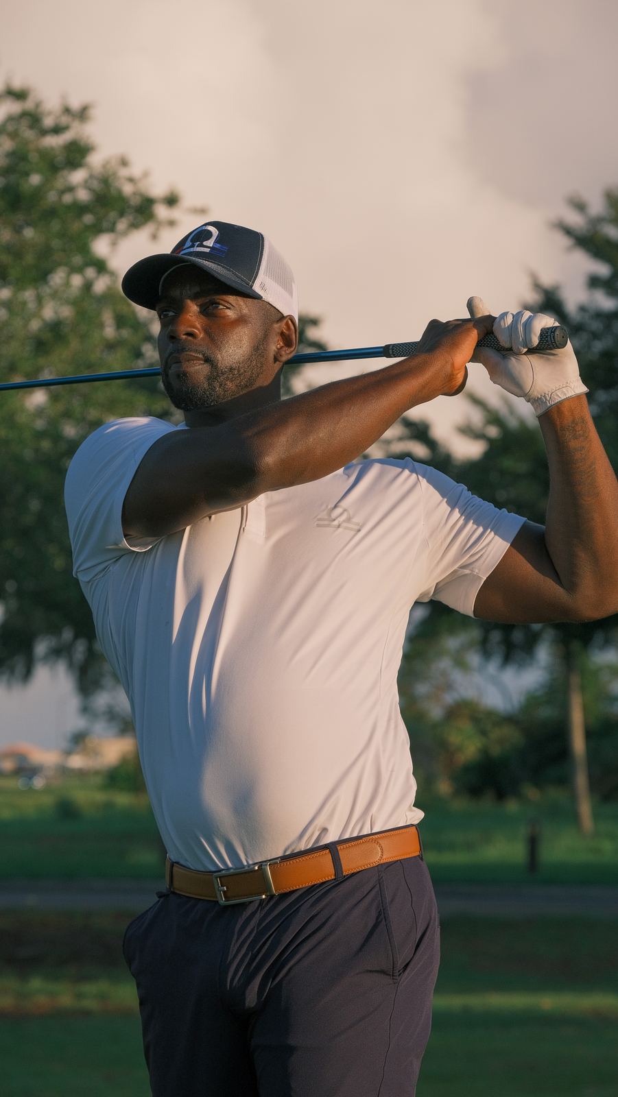 Golfer finishing his swing