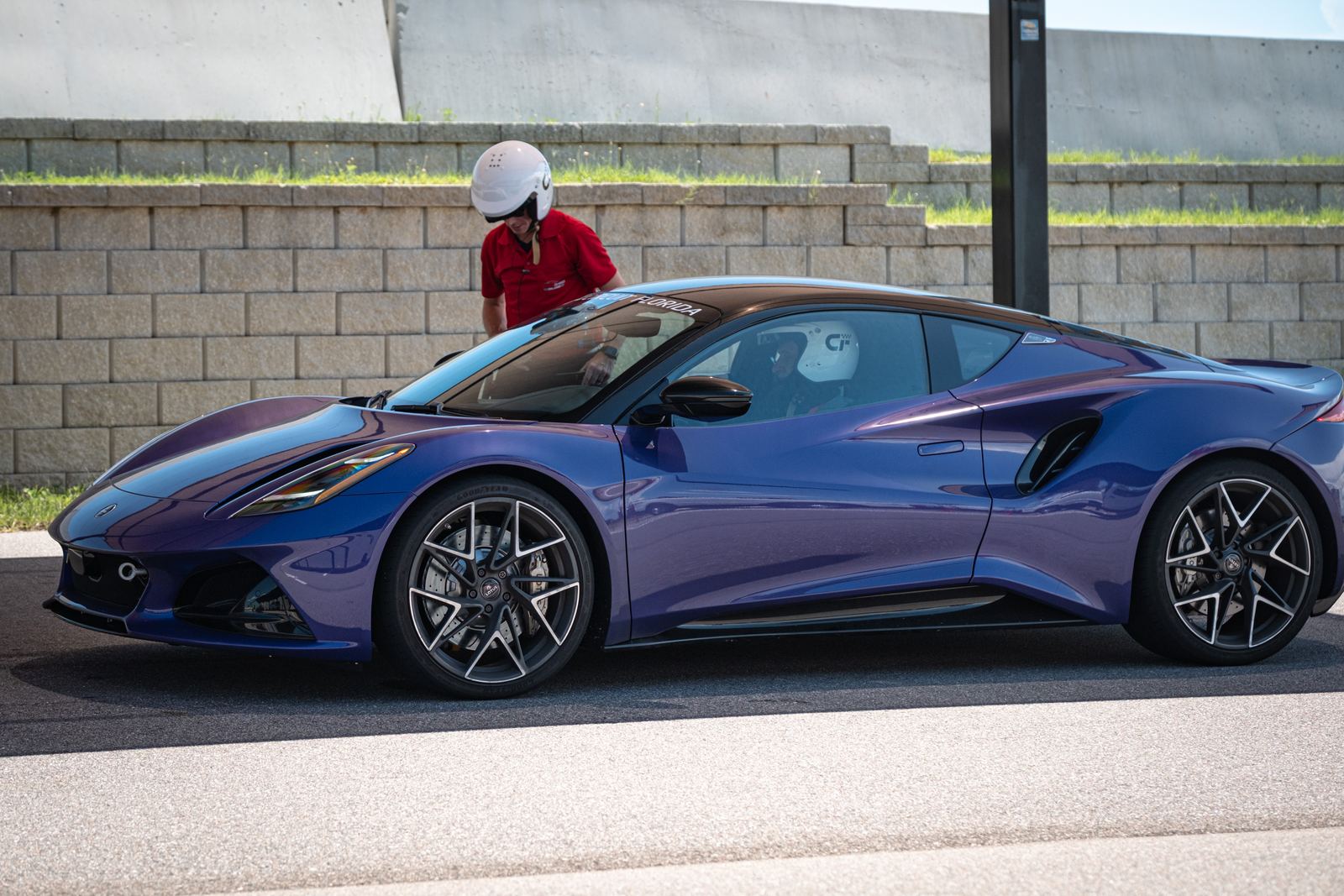 Purple sports car on track at Orlando SuperSpeed
